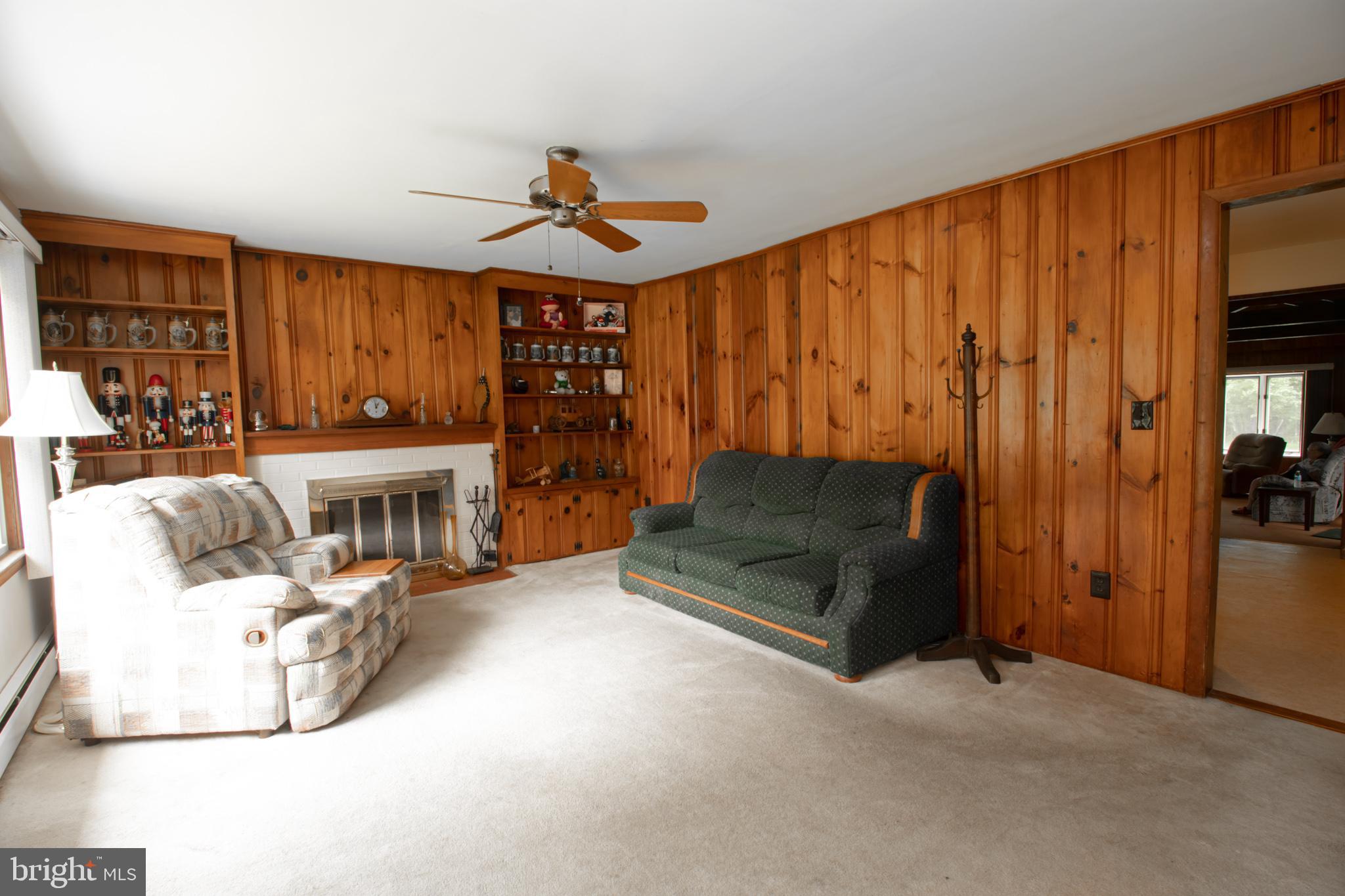 3014 Old County Road Newark, DE 19702 - Photo 15 of 38 Living Room features fireplace and ceiling fan