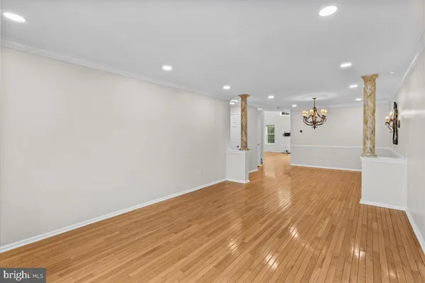 a view of entryway with wooden floor