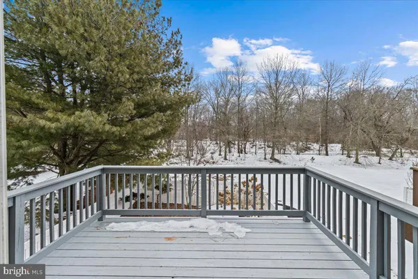 a view of staircase with white walls
