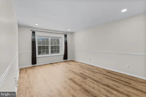 a bathroom with a shower and a toilet