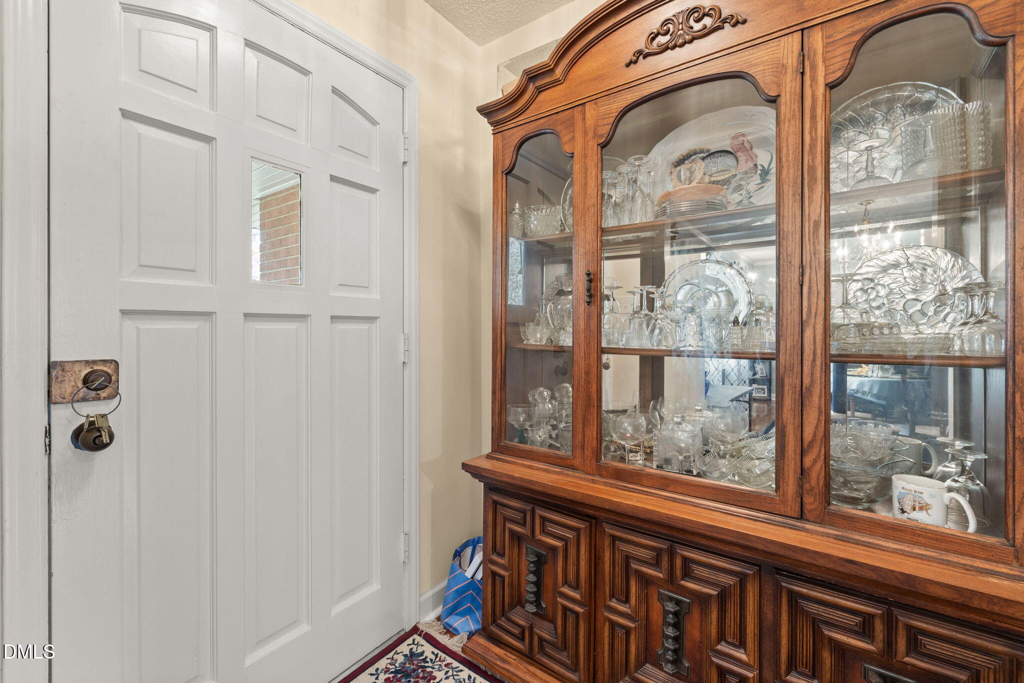 4017 Tryon Road Raleigh, NC 27606 - Photo 10 of 39 a view of a door with a glass door