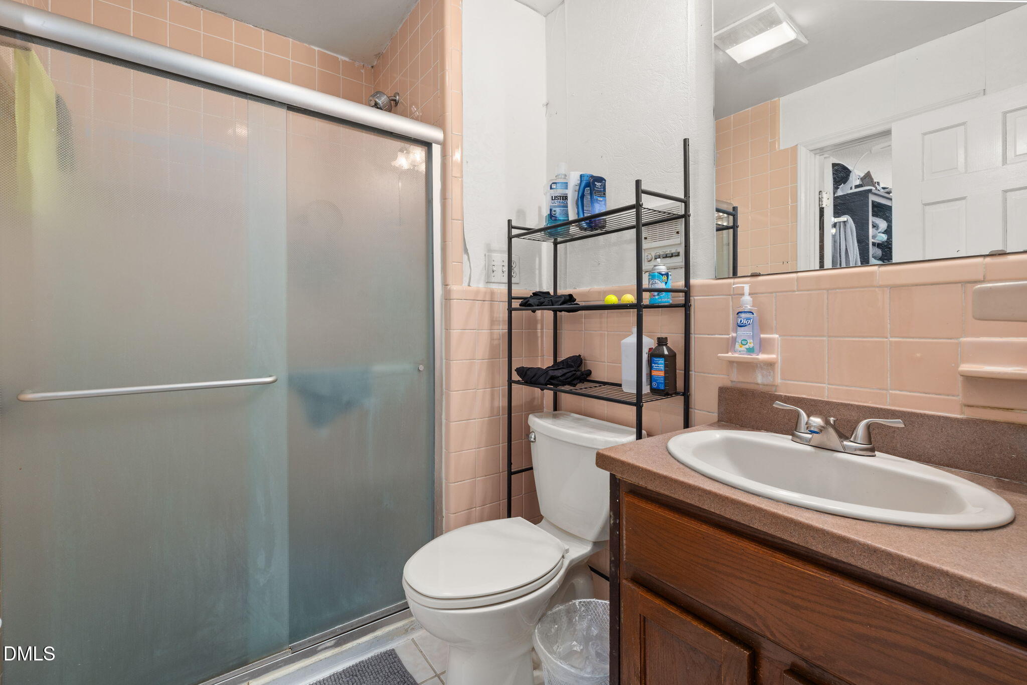4017 Tryon Road Raleigh, NC 27606 - Photo 27 of 39 a bathroom with a sink toilet and shower
