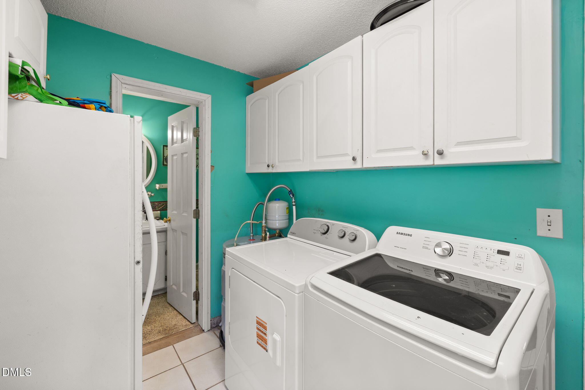 4017 Tryon Road Raleigh, NC 27606 - Photo 29 of 39 a utility room with dryer and washer