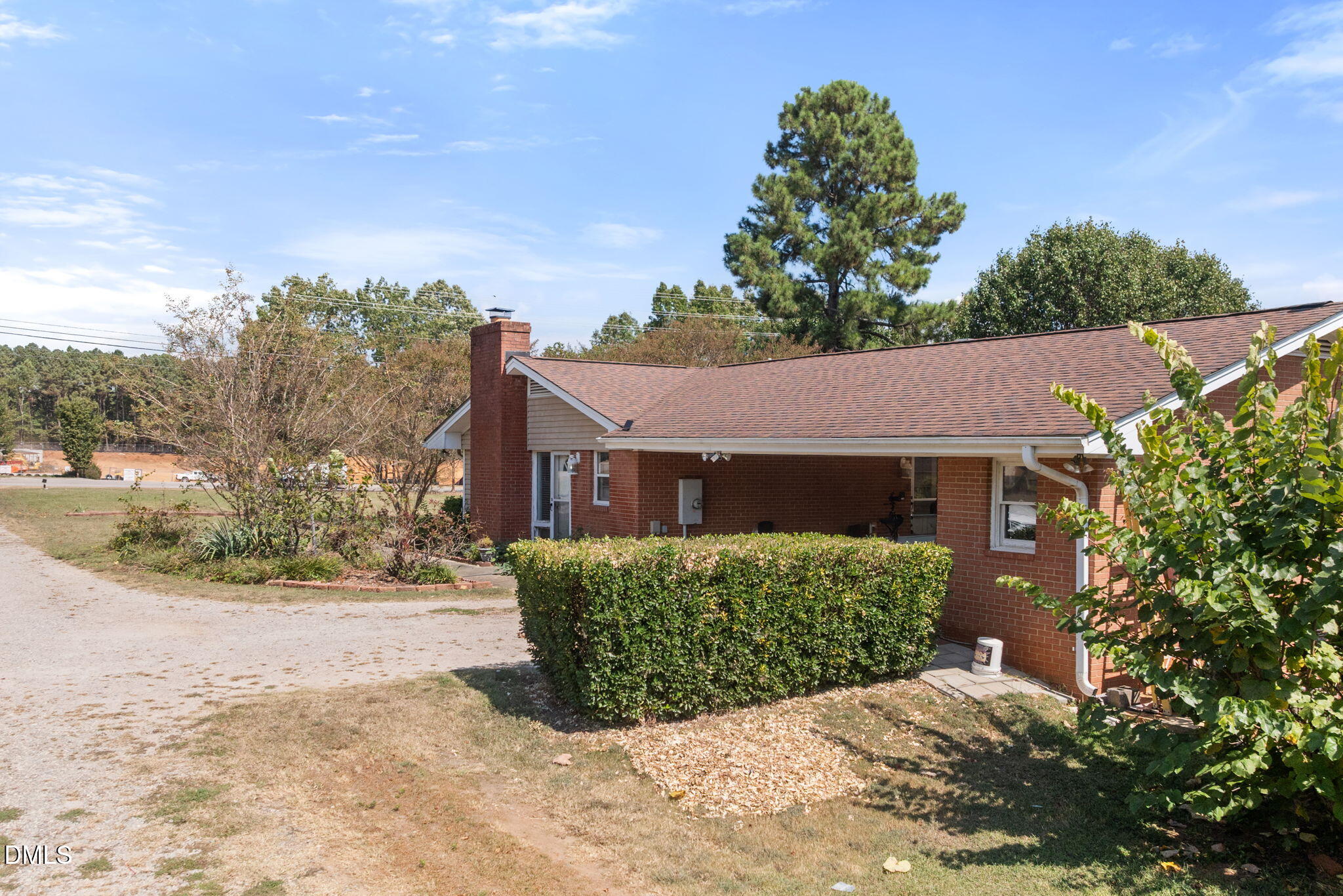 4017 Tryon Road Raleigh, NC 27606 - Photo 34 of 39 front view of a house with a yard