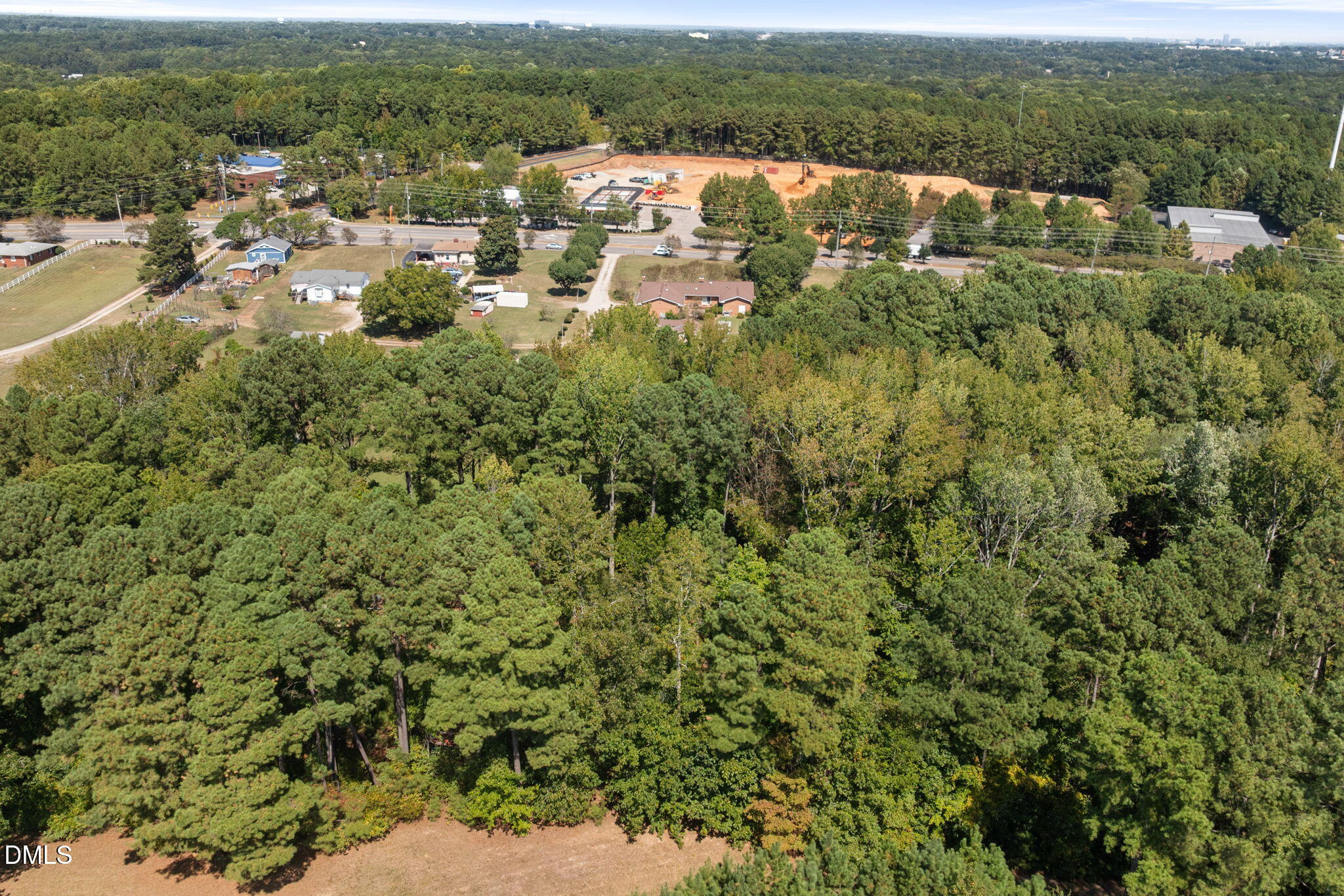 4017 Tryon Road Raleigh, NC 27606 - Photo 37 of 39 an aerial view of residential houses with outdoor space and trees