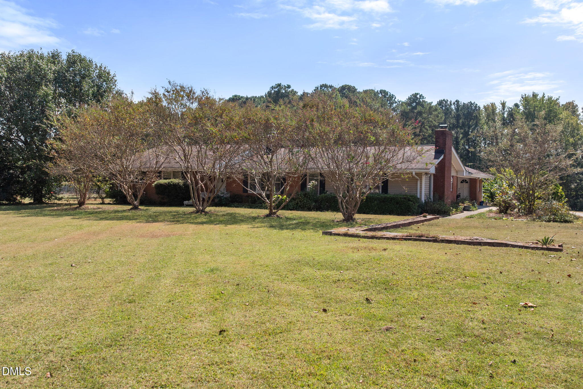 4017 Tryon Road Raleigh, NC 27606 - Photo 3 of 39 a view of swimming pool with trees in the background