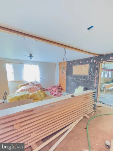 a view of a room with a wooden roof