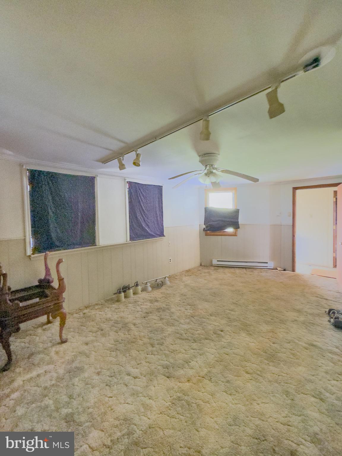 11101 Winchester Grade Road Berkeley Springs, WV 25411 - Photo 29 of 44 a bathroom with a sink and a mirror