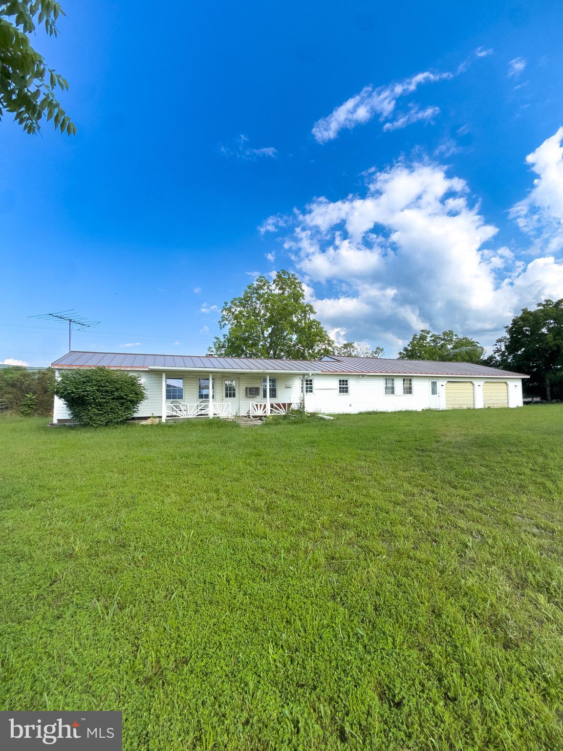 11101 Winchester Grade Road Berkeley Springs, WV 25411 - Photo 4 of 44 a view of a big yard