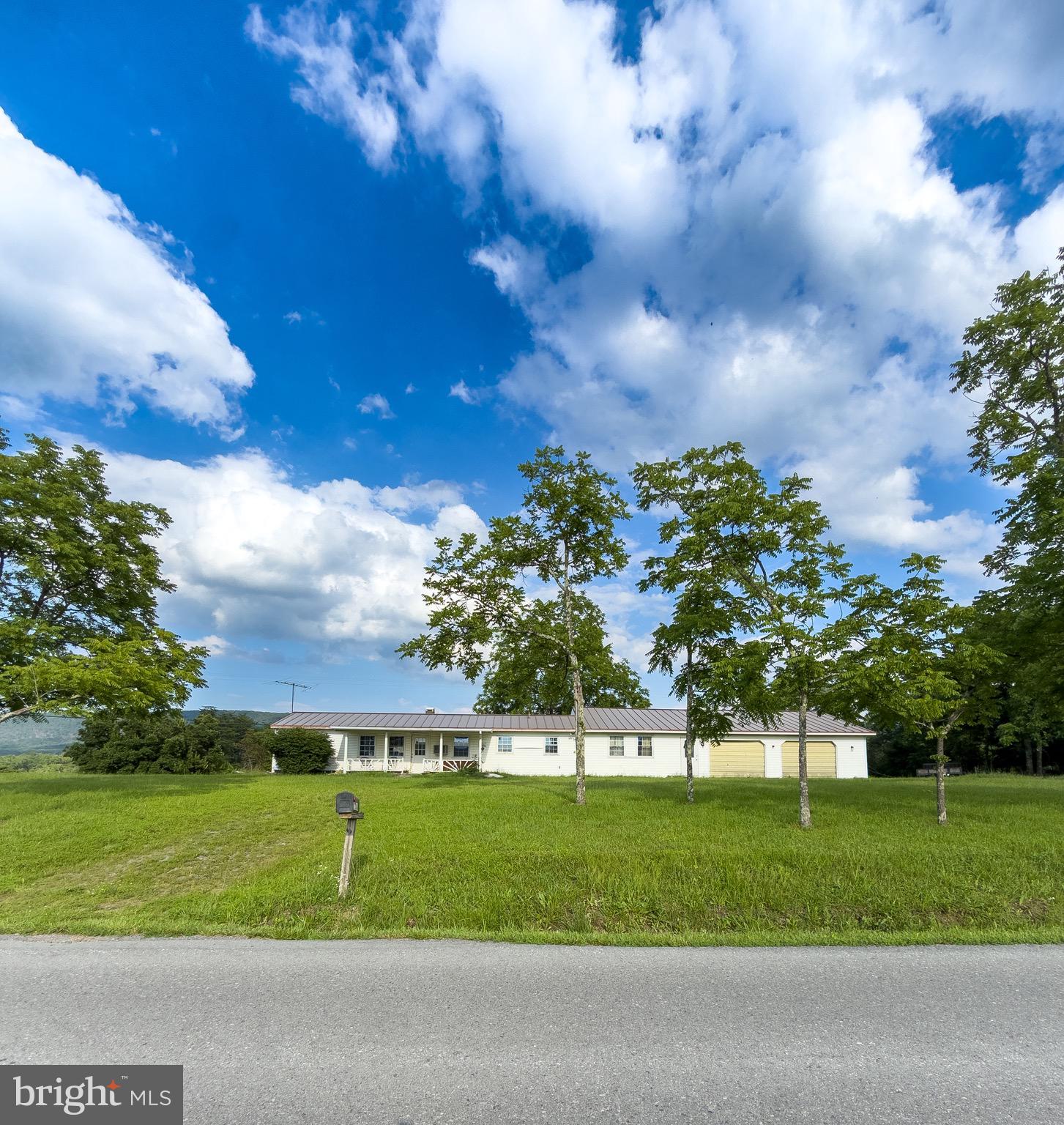 11101 Winchester Grade Road Berkeley Springs, WV 25411 - Photo 7 of 44 a view of a big yard