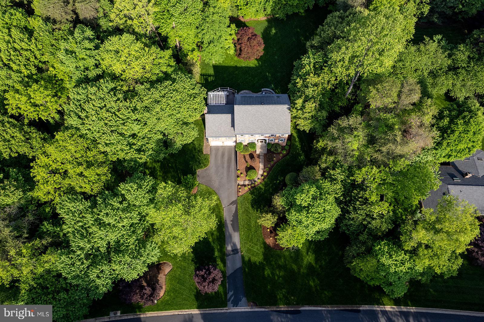 11476 Bronzedale Drive Oakton, VA 22124 - Photo 2 of 82 an aerial view of a house with a yard