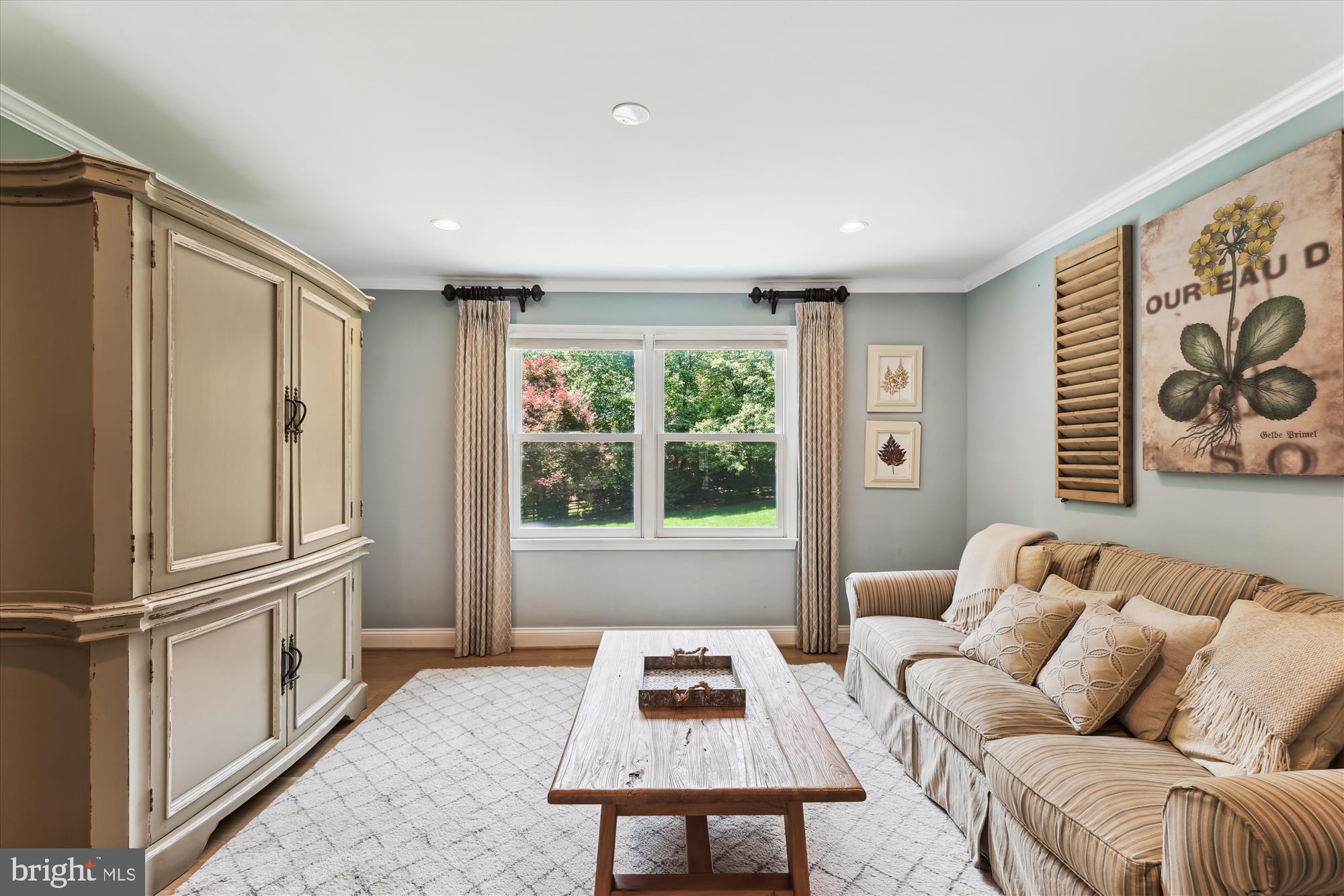 11476 Bronzedale Drive Oakton, VA 22124 - Photo 22 of 82 a living room with furniture and a window