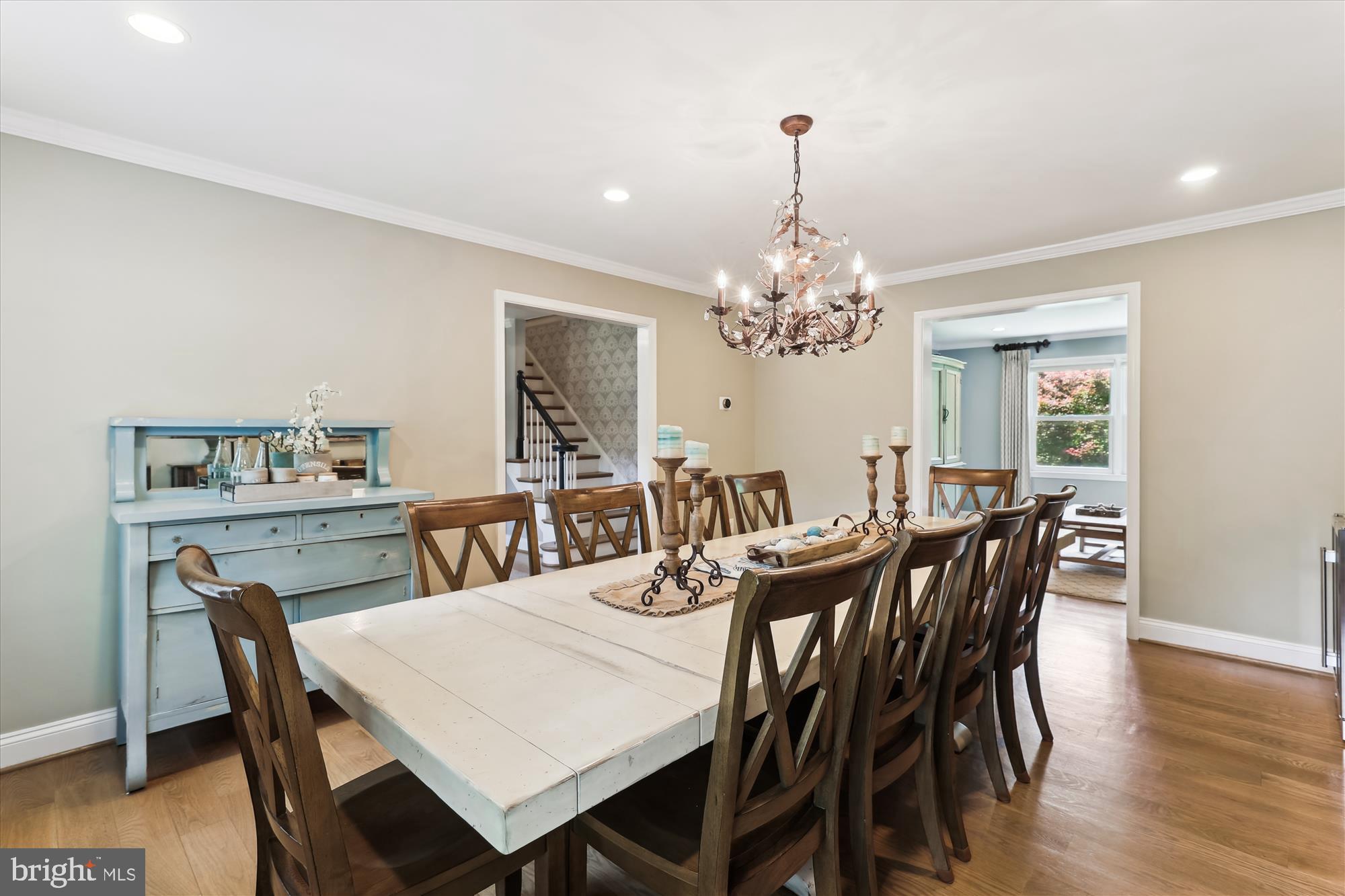 11476 Bronzedale Drive Oakton, VA 22124 - Photo 26 of 82 a view of a dining room with furniture a chandelier and wooden floor