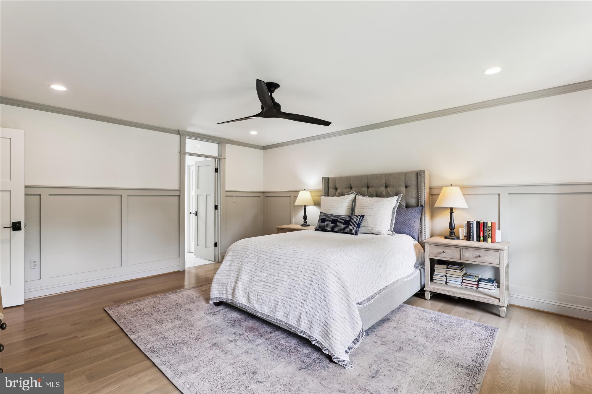 11476 Bronzedale Drive Oakton, VA 22124 - Photo 33 of 82 a bedroom with a bed and a painting on the wall