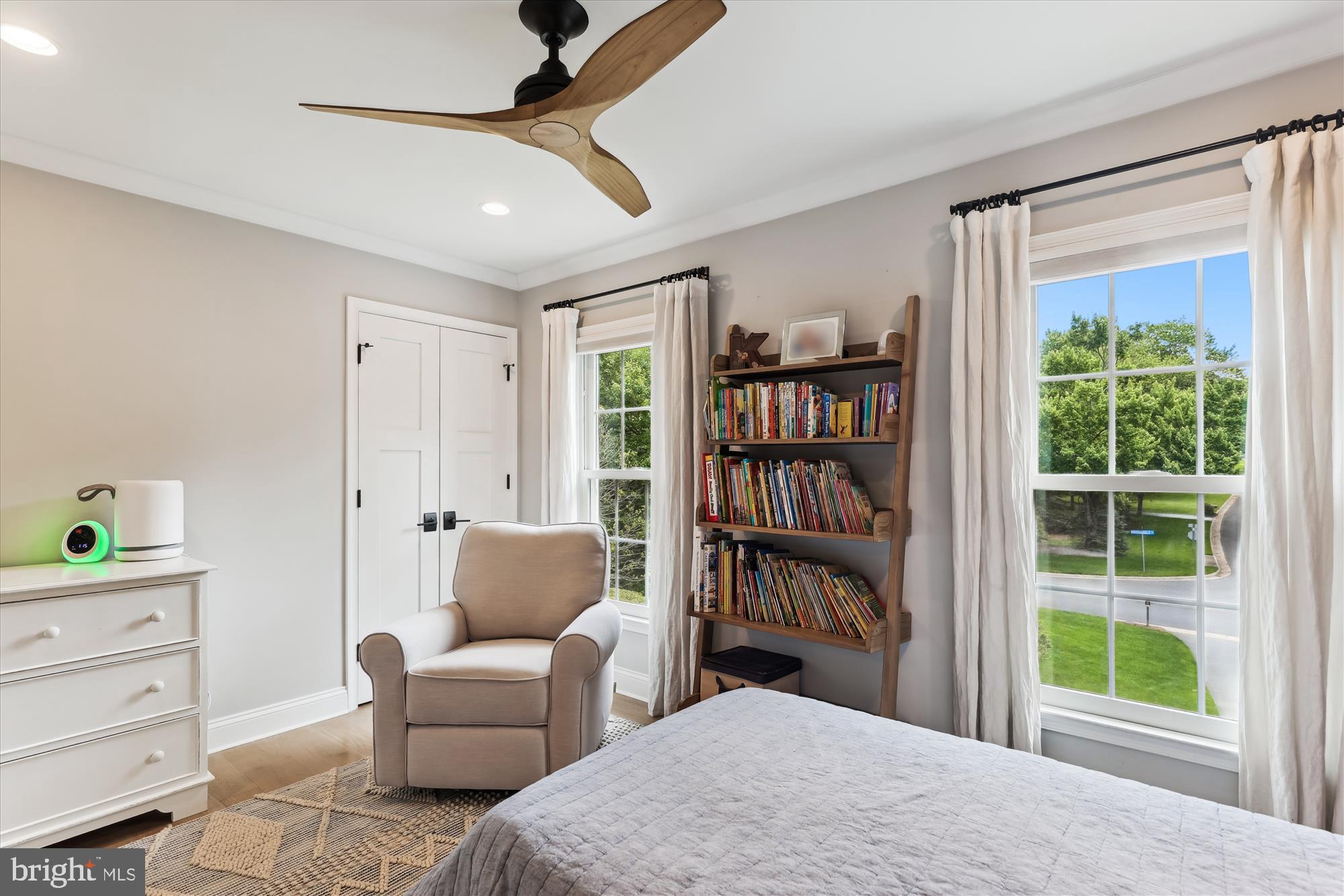 11476 Bronzedale Drive Oakton, VA 22124 - Photo 41 of 82 a living room with furniture and a book shelf