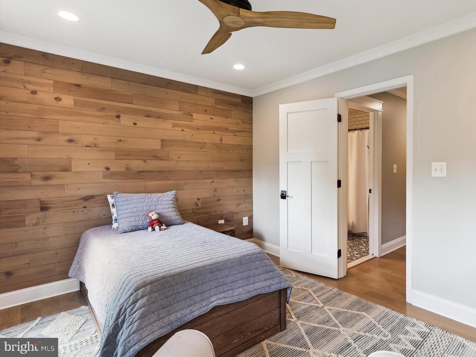 11476 Bronzedale Drive Oakton, VA 22124 - Photo 42 of 82 a bedroom with a bed and a walk in closet