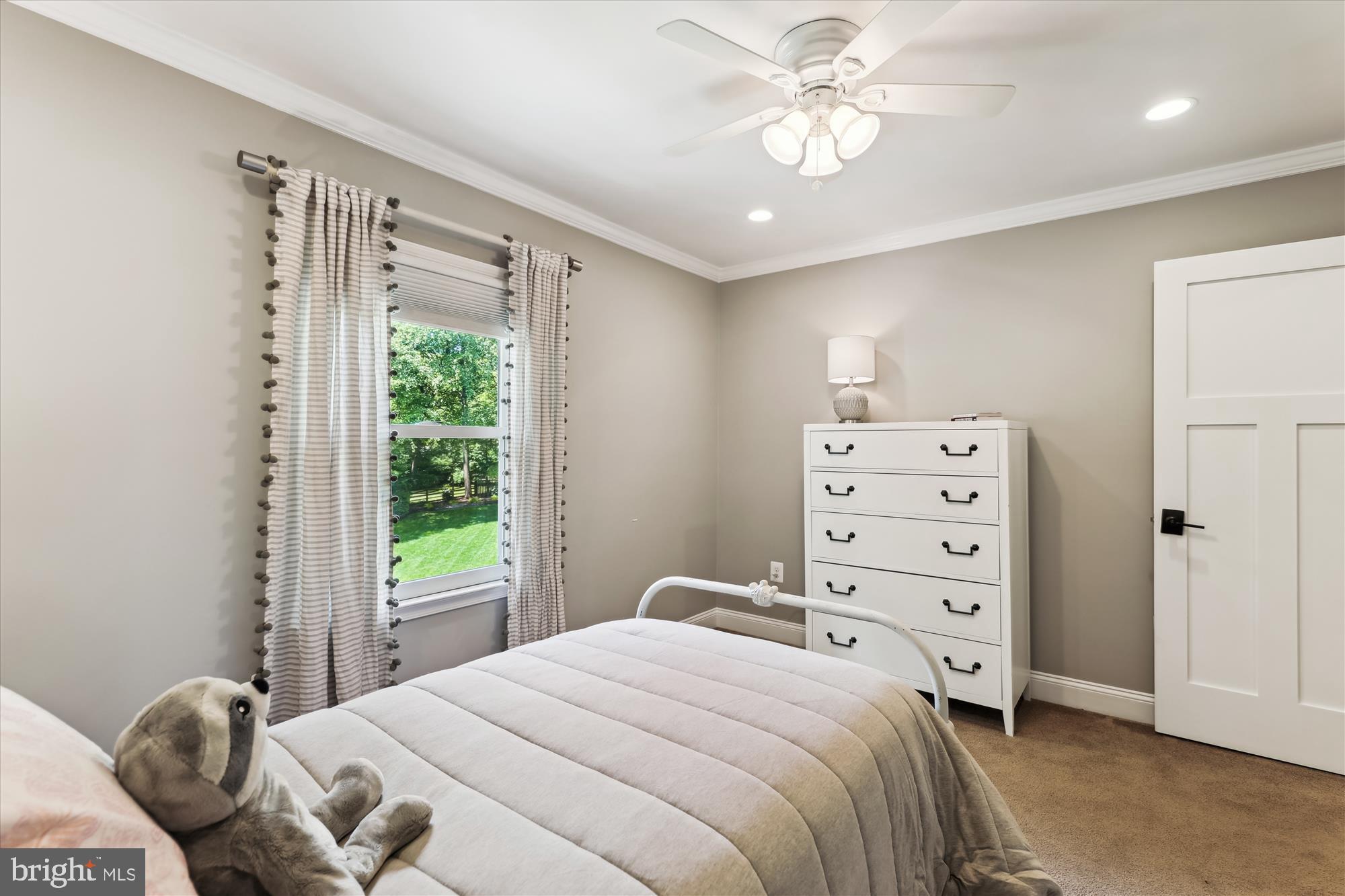 11476 Bronzedale Drive Oakton, VA 22124 - Photo 46 of 82 a bedroom with a bed and a window