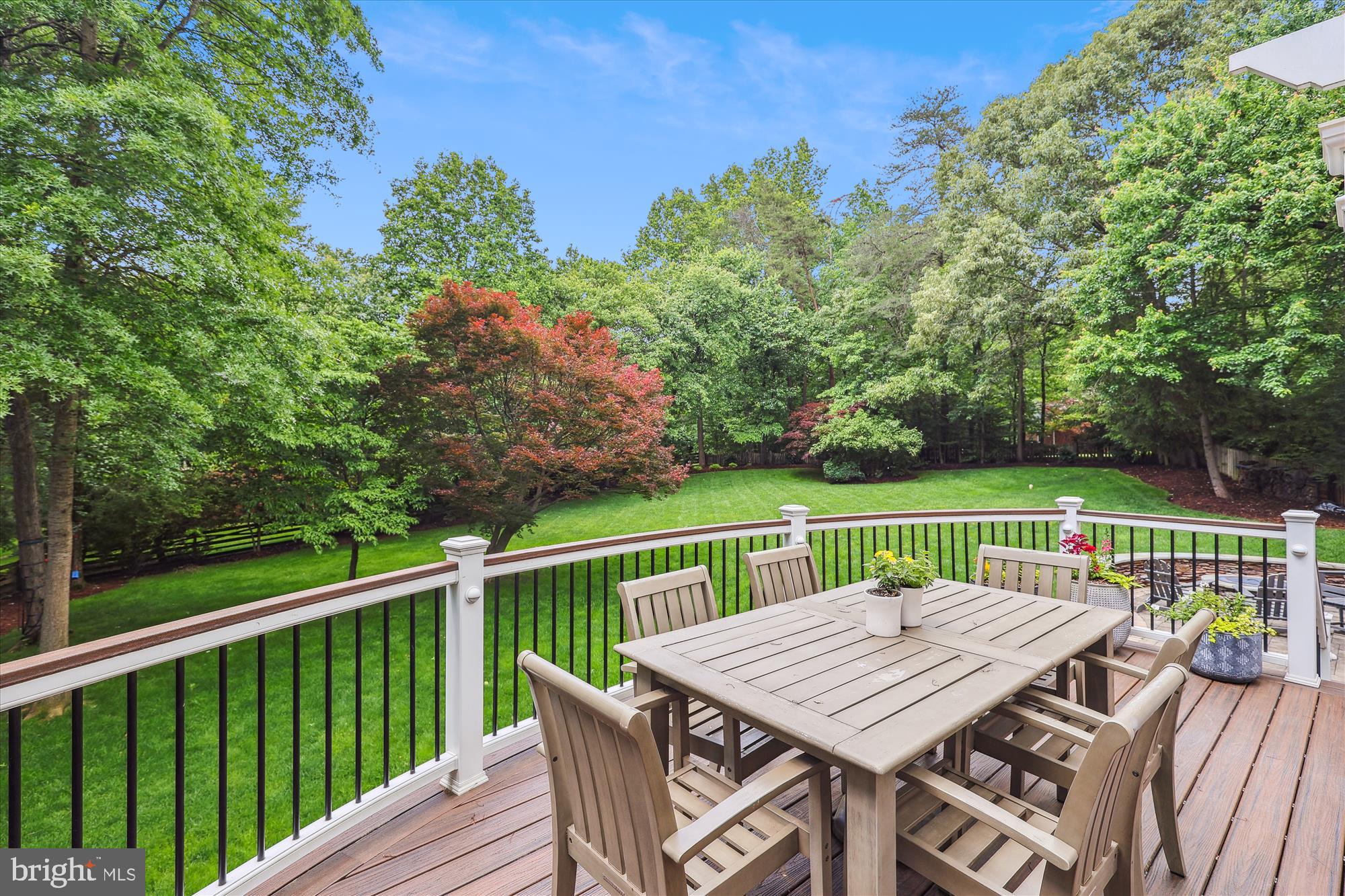 11476 Bronzedale Drive Oakton, VA 22124 - Photo 5 of 82 a view of a deck with two chairs and wooden floor