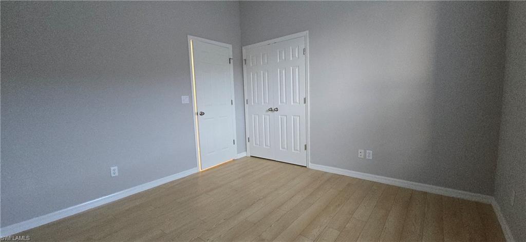 2086 Grove Drive Naples, FL 34120 - Photo 20 of 24 a view of an empty room