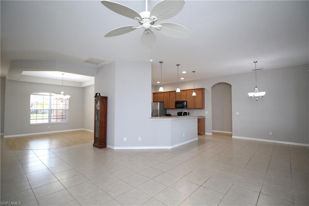 2086 Grove Drive Naples, FL 34120 - Photo 6 of 24 a view of an empty room and window