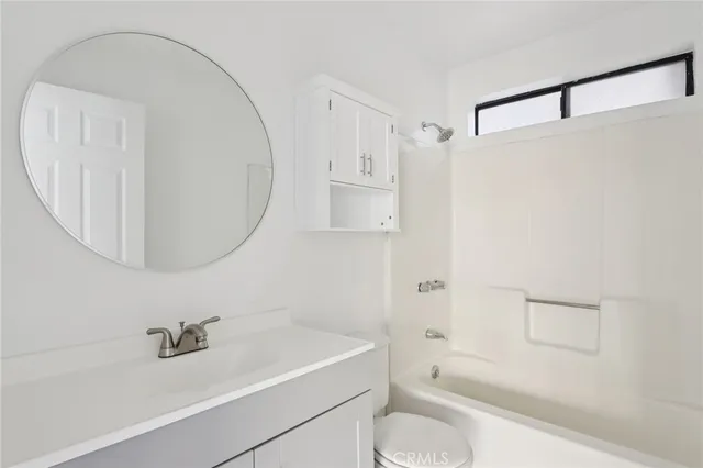 a view of a balcony with wooden floor