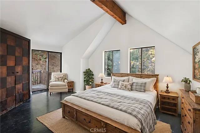 a view of a wooden door with a balcony