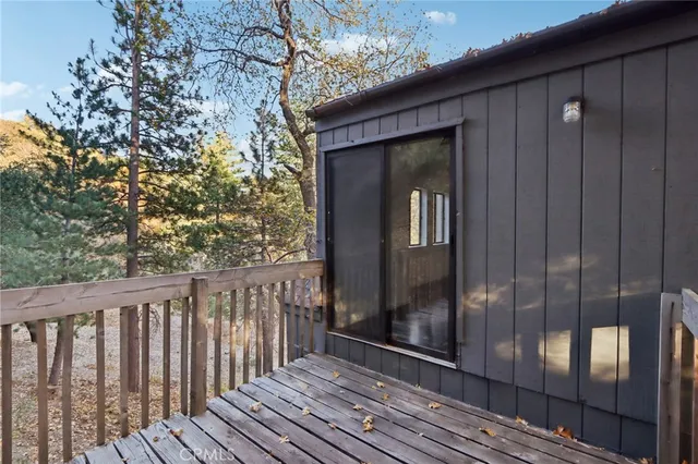a view of a house with a tree