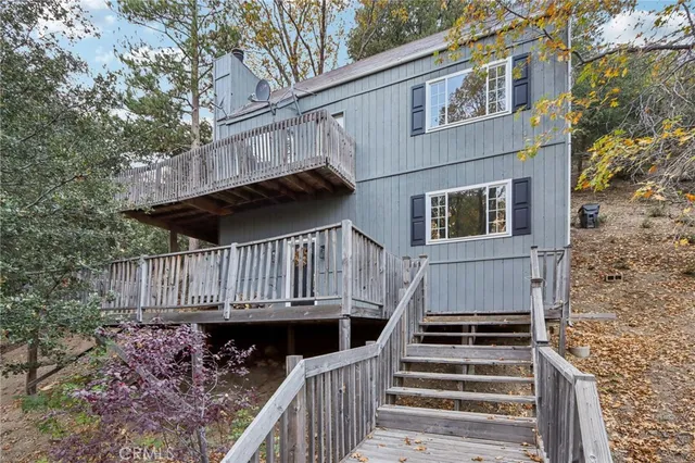 a view of balcony with deck and wooden floor