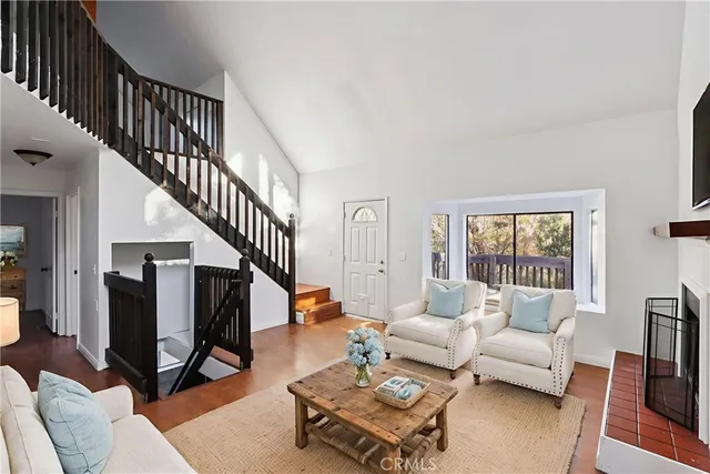 a view of entryway livingroom and hall