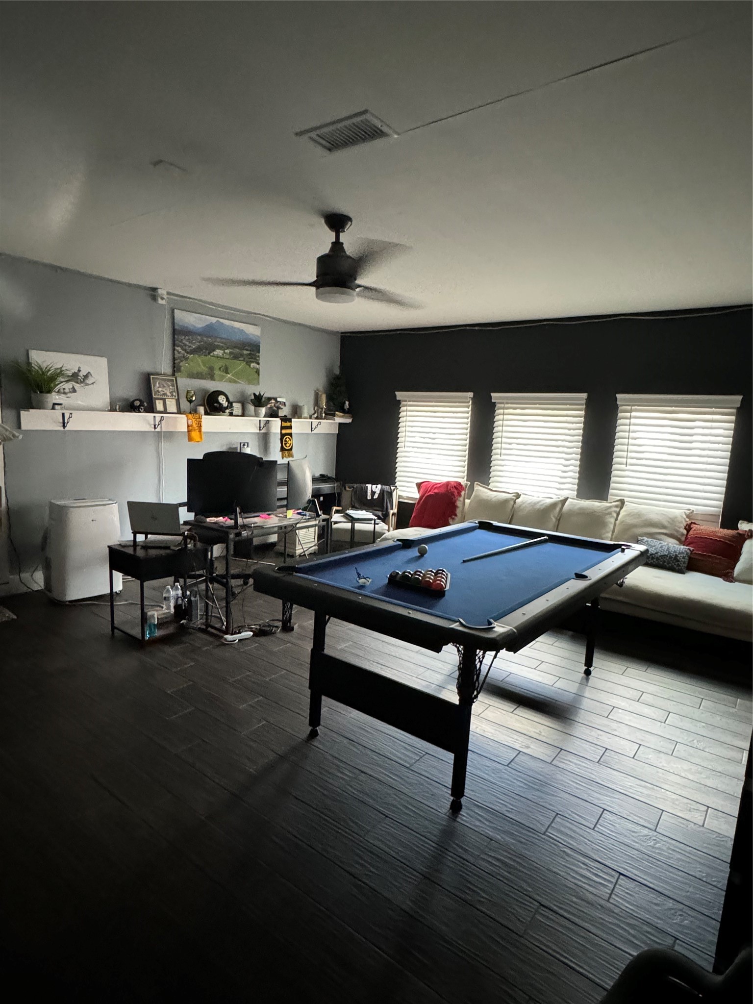 291 Brian Lane Kyle, TX 78640 - Photo 29 of 34 a living room with furniture pool table and a flat screen tv