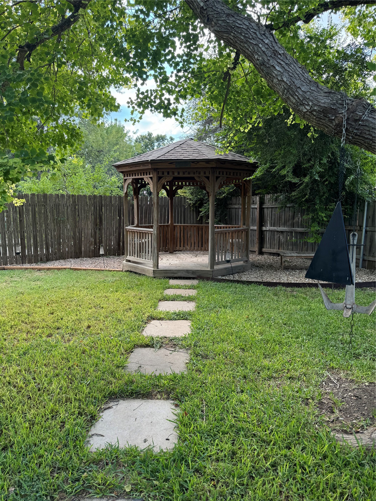 291 Brian Lane Kyle, TX 78640 - Photo 4 of 34 a front view of house with a garden