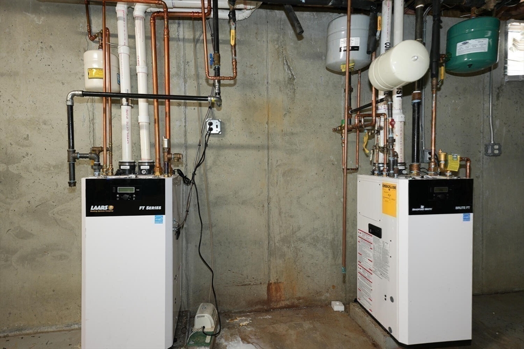 103 Devon Street Boston, MA 02121 - Photo 27 of 28 a bathroom with a sink and a mirror