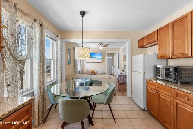a utility room with sink dryer and washer