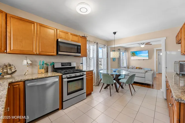 a bedroom with a bed and a chair