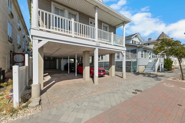 a view of a building with a porch