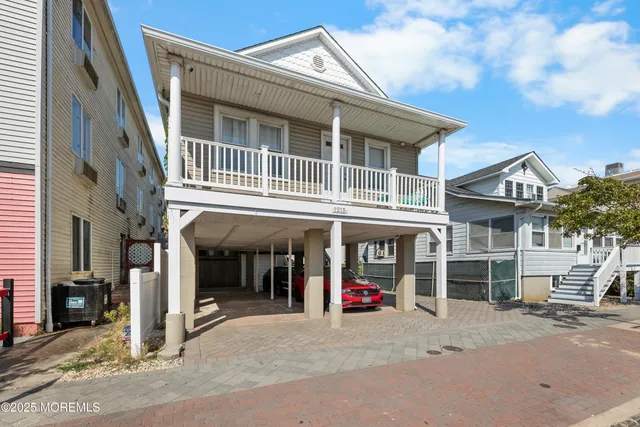 a front view of a house with a garage