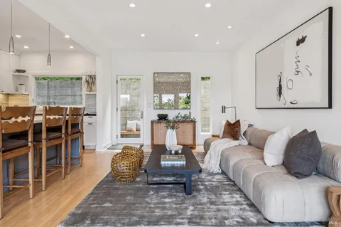 a kitchen with stainless steel appliances granite countertop a stove and a sink