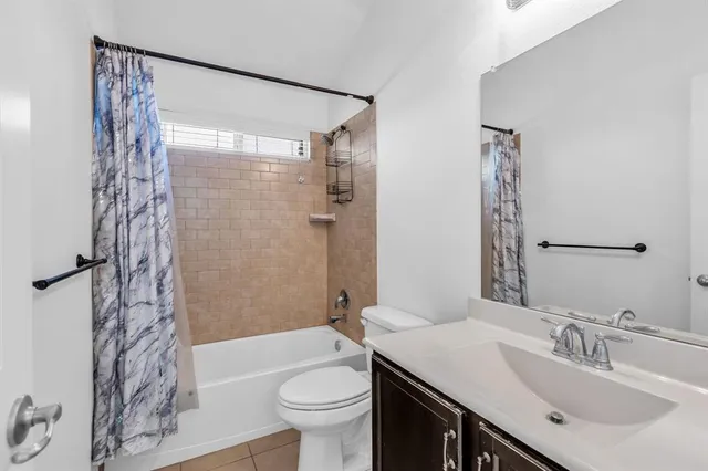 a view of a big room with carpet