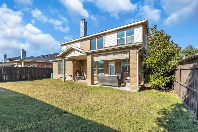 a house view with a outdoor space