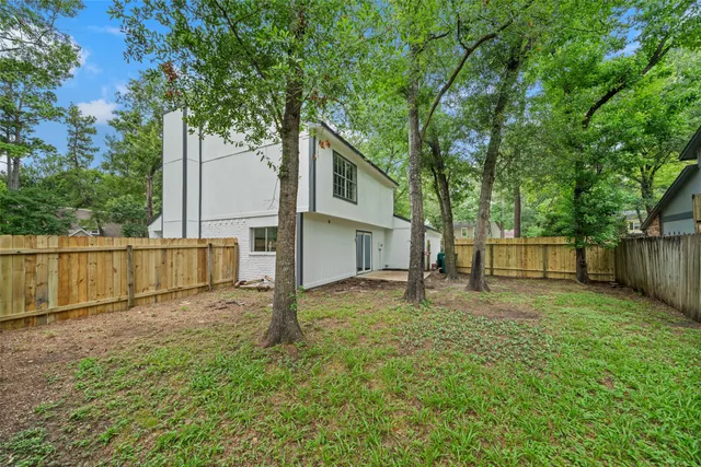 $360,000 | 90 Crystal Lake Lane, The Woodlands, TX 77380
