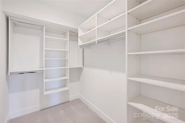 a view of an empty walk in closet