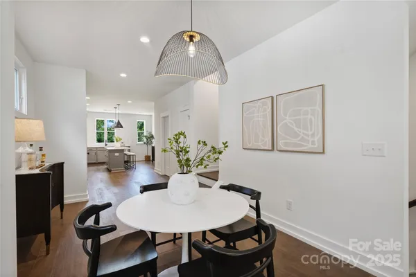 a view of a dining room with furniture