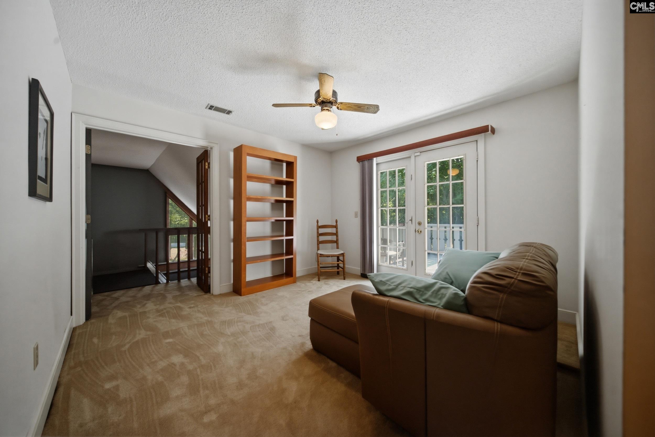 4324 Syrup Mill Road Ridgeway, SC 29130 - Photo 27 of 61 a living room with furniture and a window
