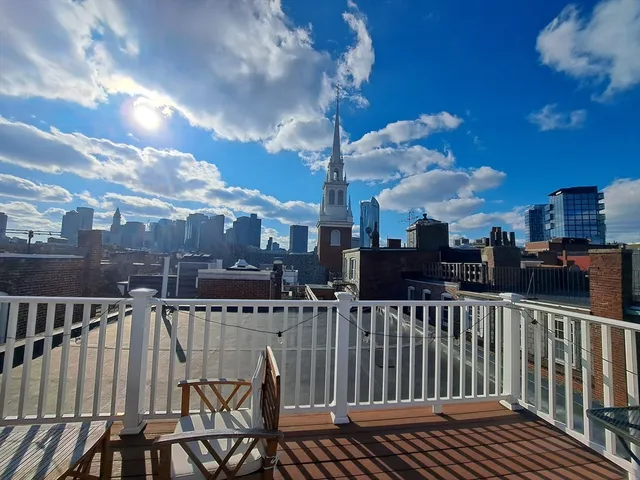 a view of a balcony with city view