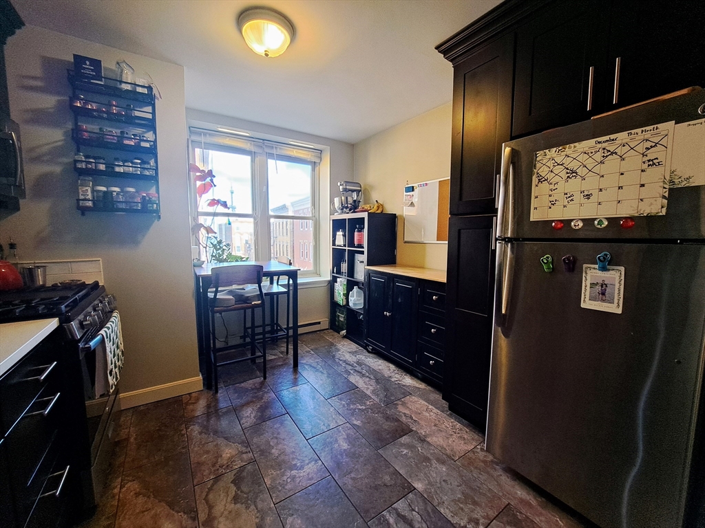 38 Charter Street, Unit 11 Boston, MA 02113 - Photo 2 of 17 a room with furniture and window