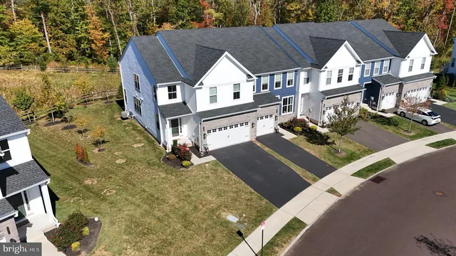 a view of a house with large windows