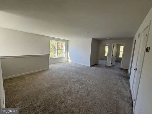a view of hallway with stairs