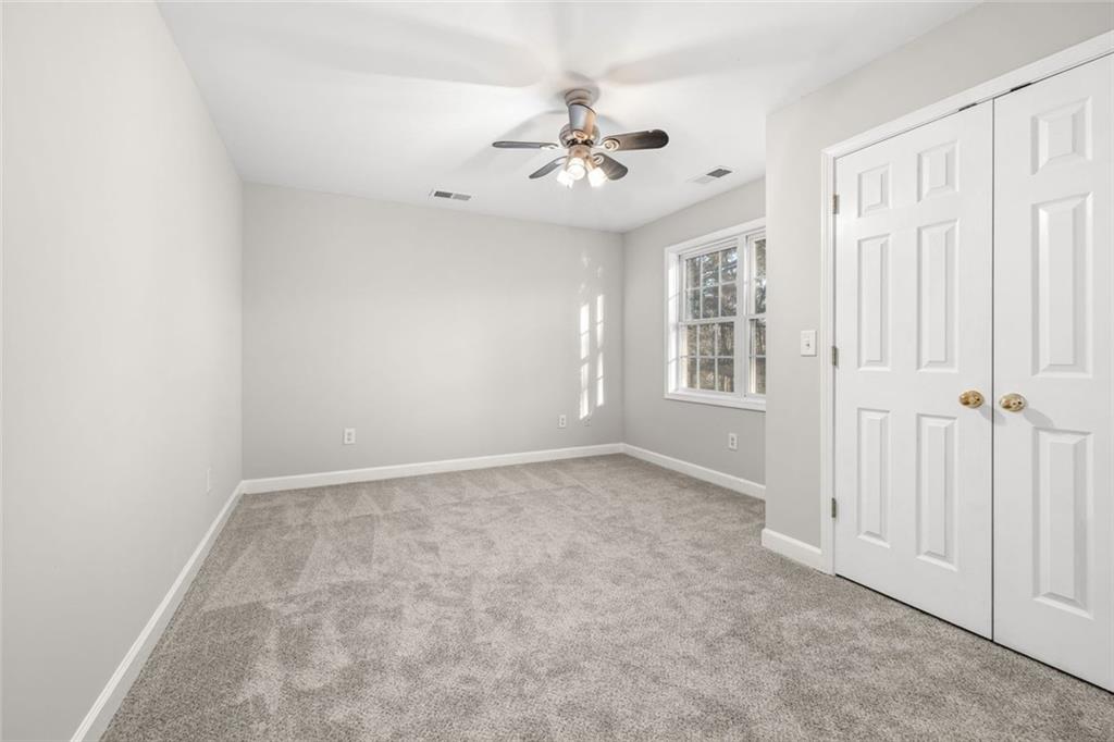 4239 Mangum Mill Road Gainesville, GA 30507 - Photo 21 of 33 a view of an empty room with a window