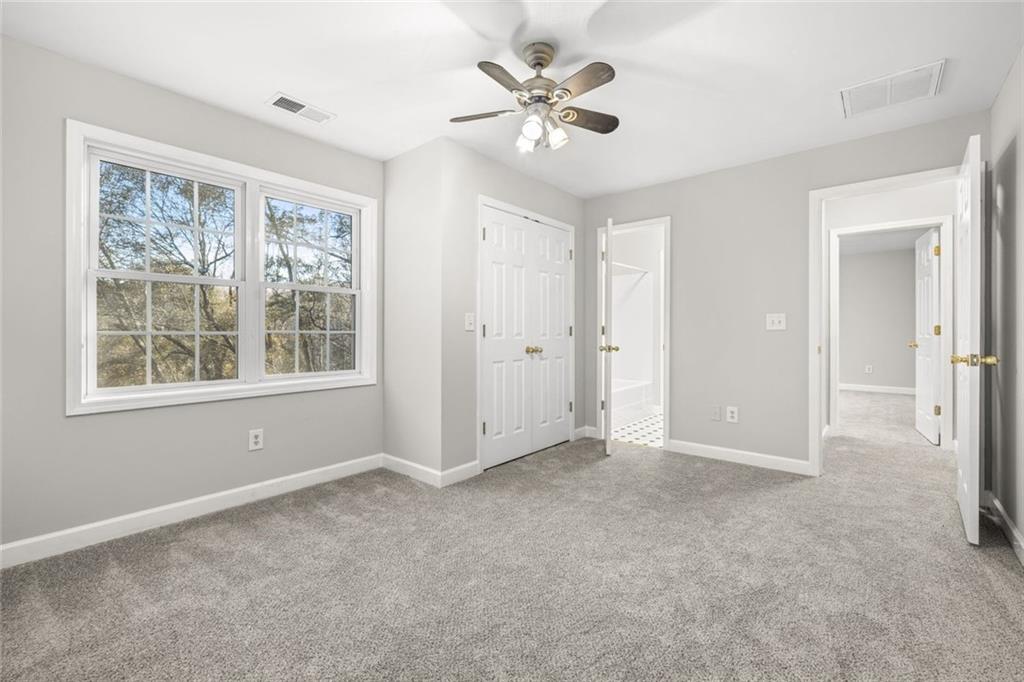 4239 Mangum Mill Road Gainesville, GA 30507 - Photo 22 of 33 a view of an empty room with a window