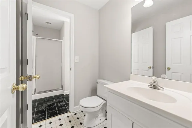 a view of a room with wooden walls